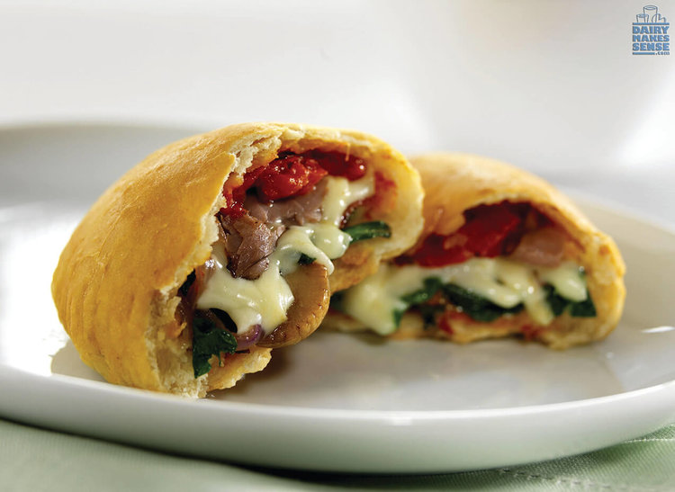 Three cheese, veggie and beef calzone