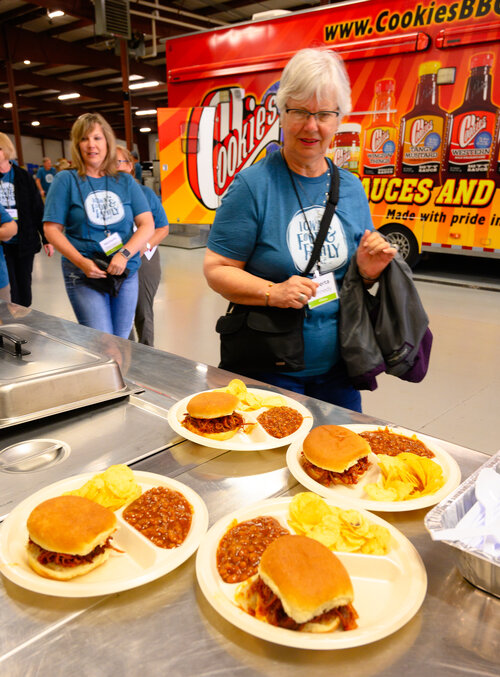 After a tour of Cookies Food Products, guests enjoyed pulled-pork sandwiches and baked beans… with Cookies BBQ sauce, of course! Photo credit: Joseph L. Murphy/Iowa Soybean Association
