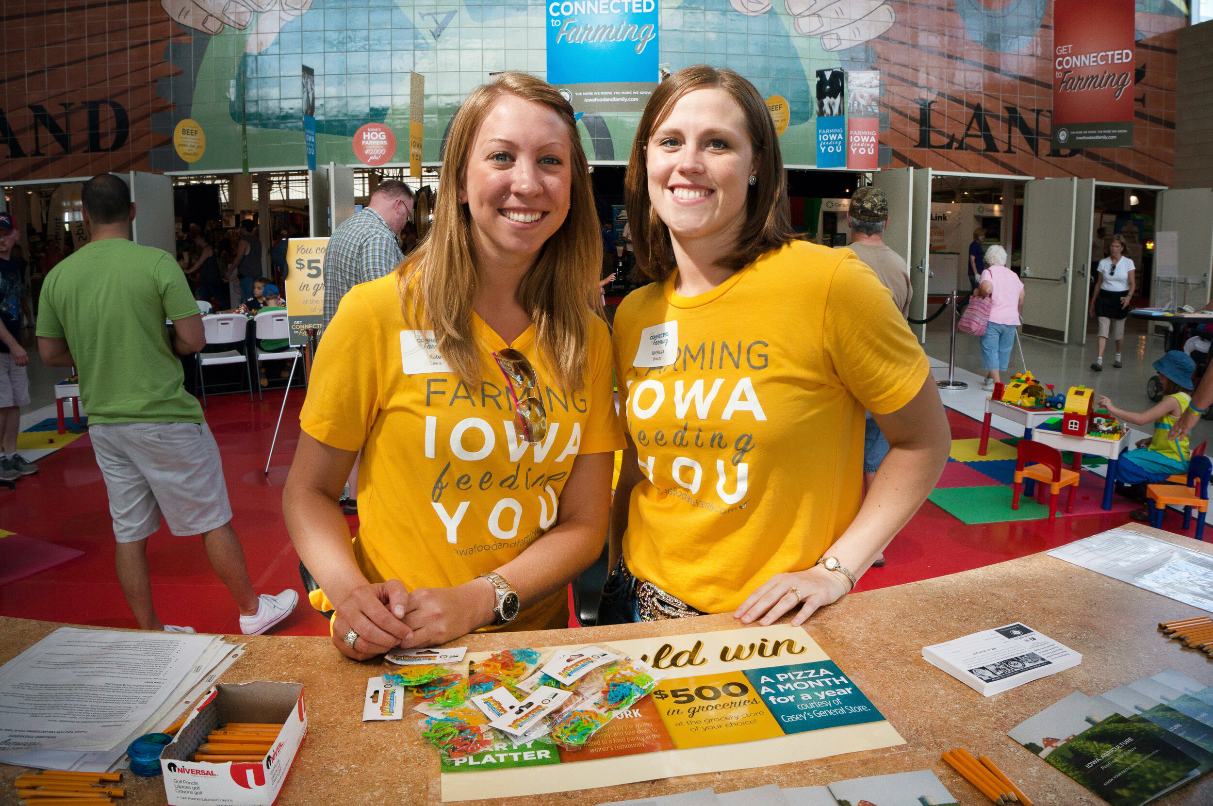 Volunteers welcome fairgoers to the 2013 display.